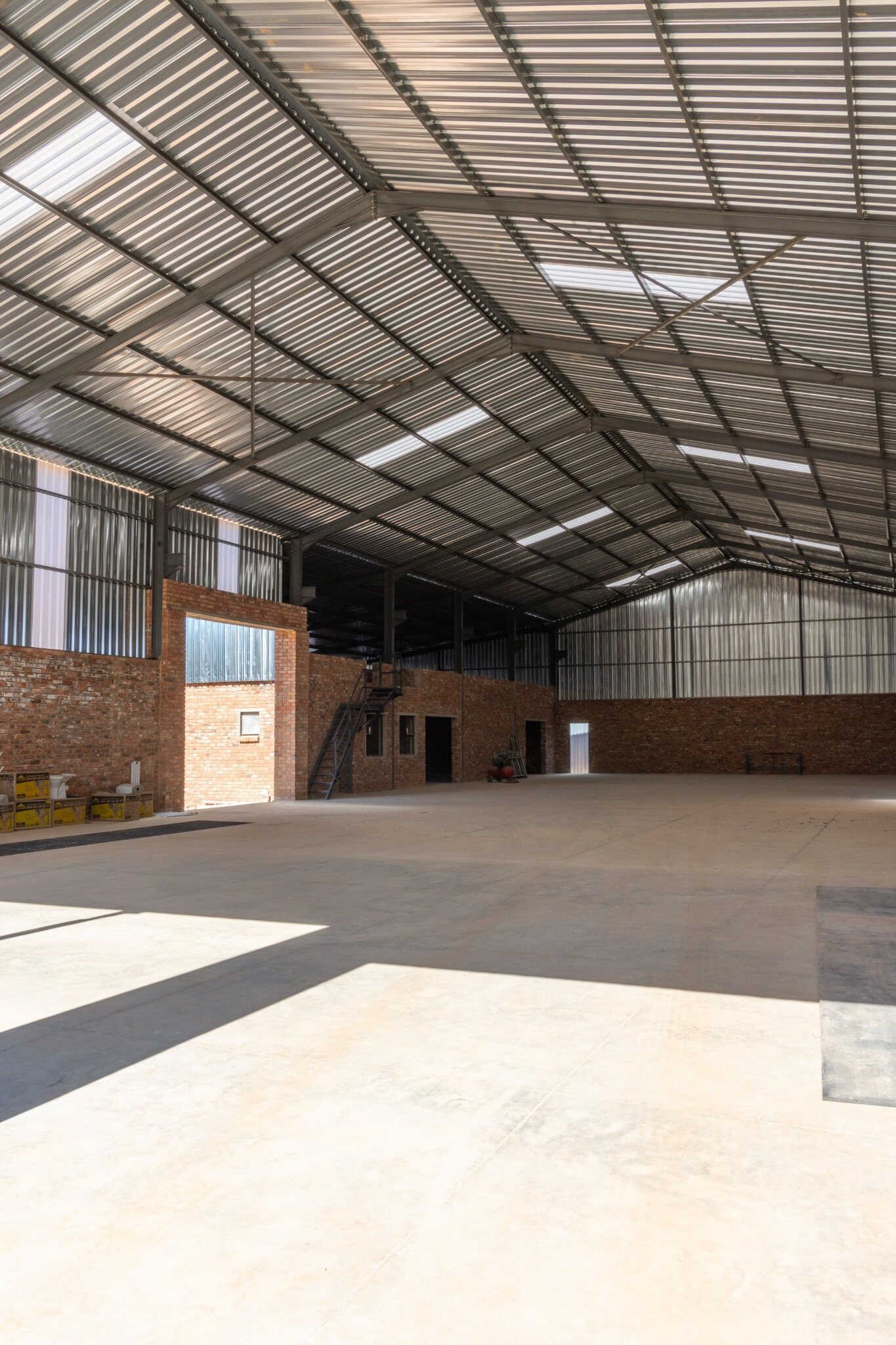 Completed industrial workshop floor roof structure cladding and service pit