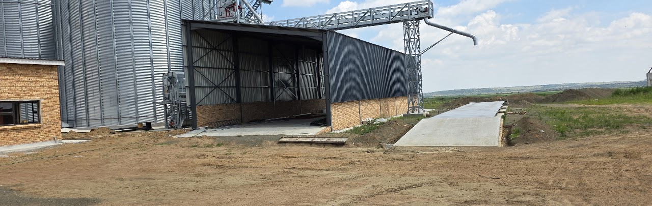 Completed Koppies grain silo development showing structural steel, weighbridge civil works and concrete aprons