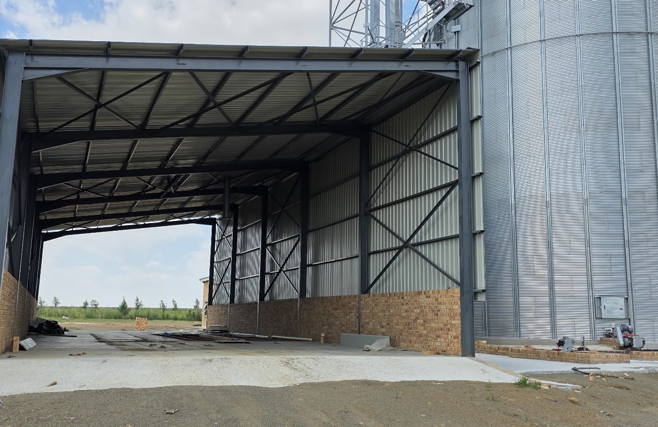 Ten by twenty-four metre structural steel building with cladding and concrete floor at Koppies